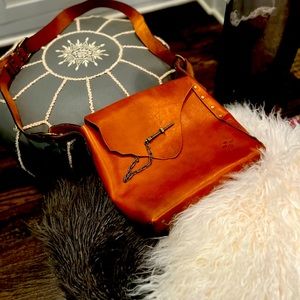 Gently used like New beautiful cognac brown genuine leather hobo bag.